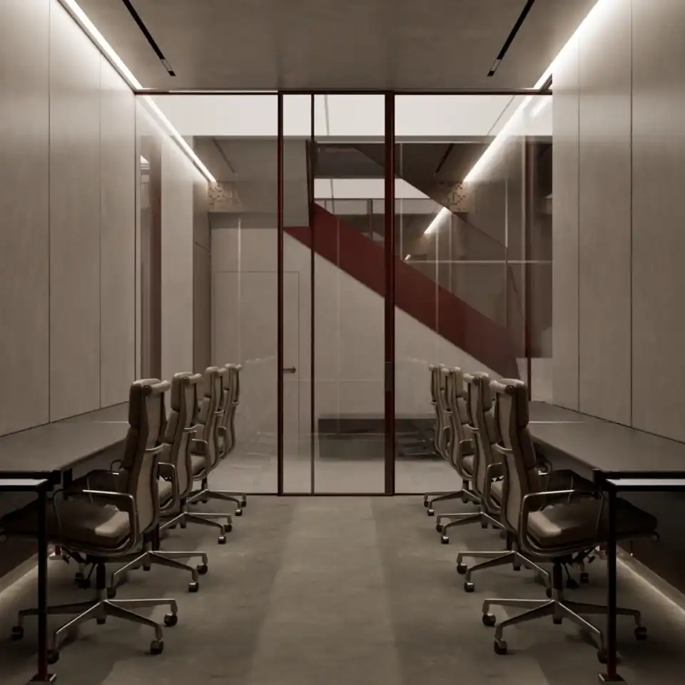 Co-working floor with desk ranks either side of the circulation