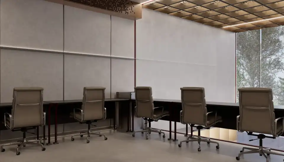 Desks along the window under the brass ceiling